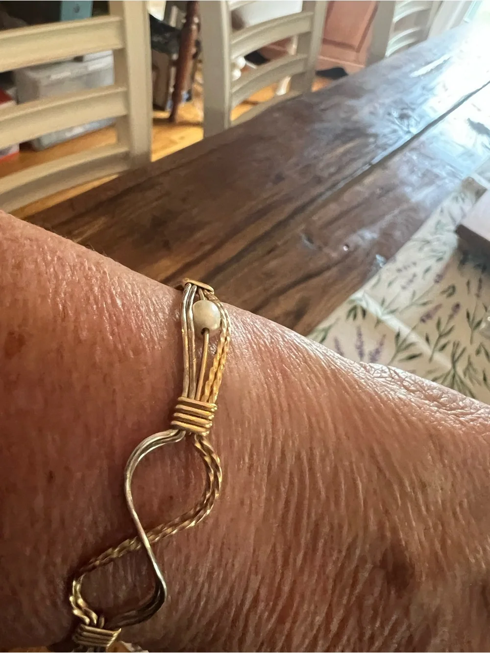 Handcrafted Gold-Tone Wire Wrapped Bracelet with Pearl Accents. Ronaldo brand